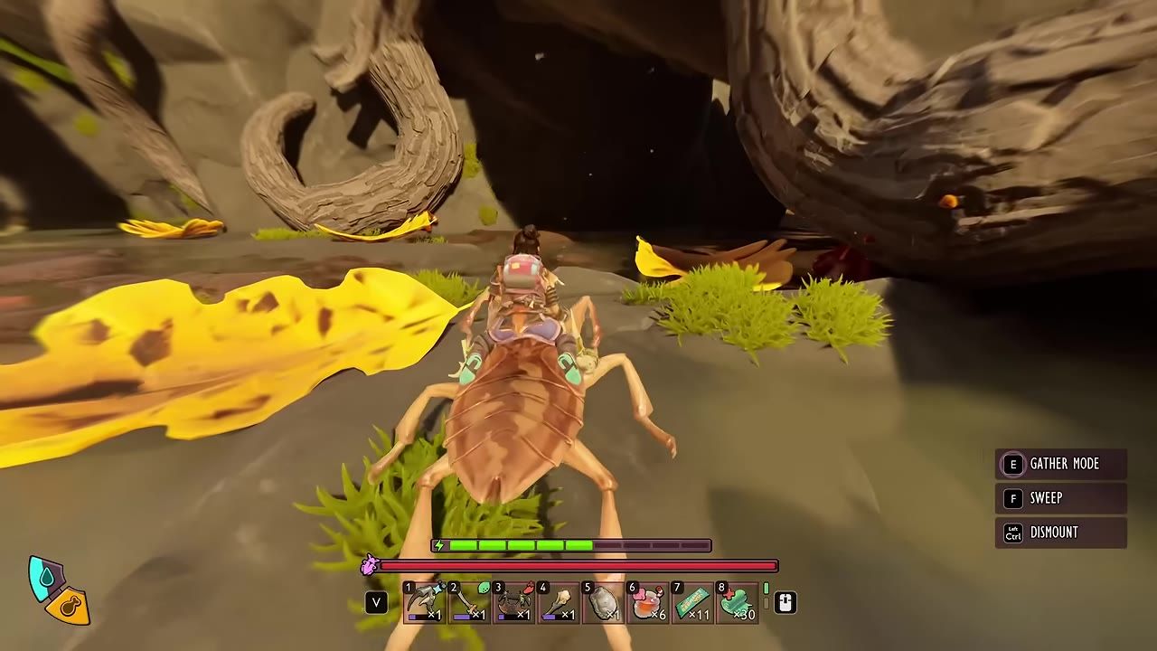 A character rides a large insect through a rocky underground area with yellow leaves and tufts of grass, while the game HUD shows mount controls and inventory slots.