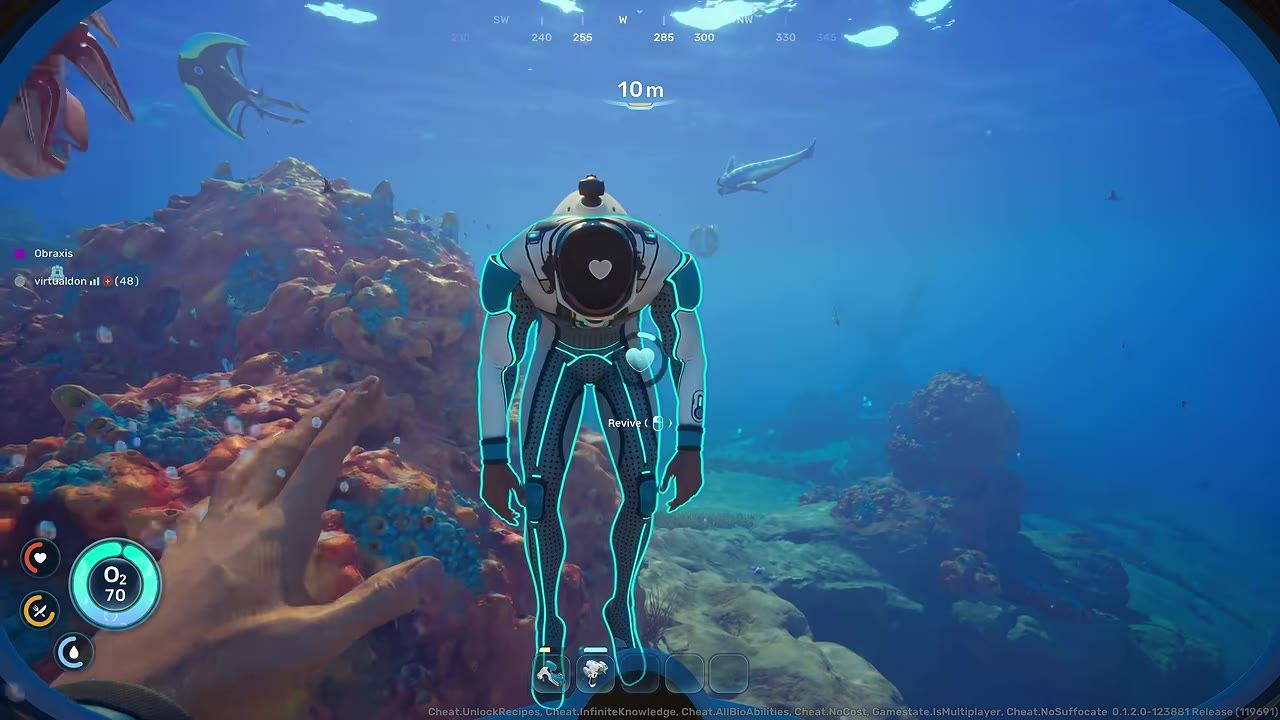 A player swims up to a downed teammate outlined in cyan, with a revive prompt centered on the figure and underwater terrain all around.