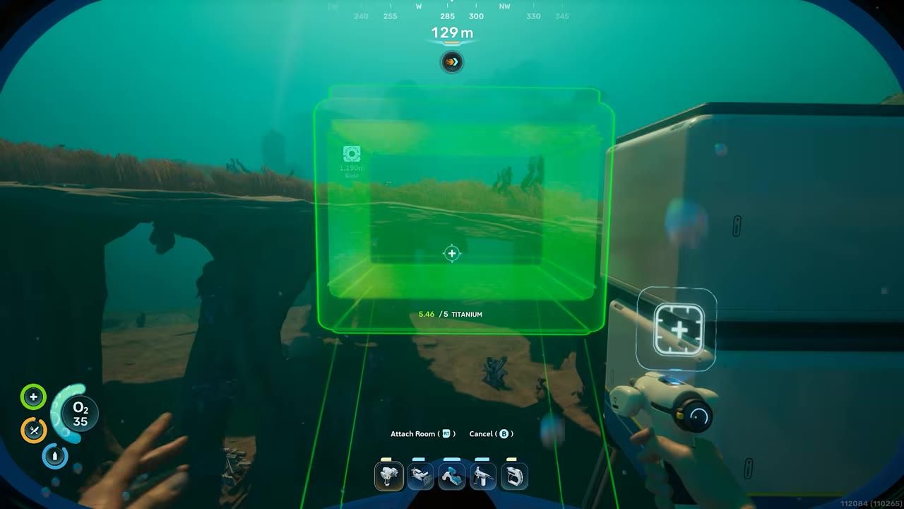 A first-person underwater view shows a green hologram preview of a room module being attached to a base structure, with resource and oxygen HUD elements on screen.