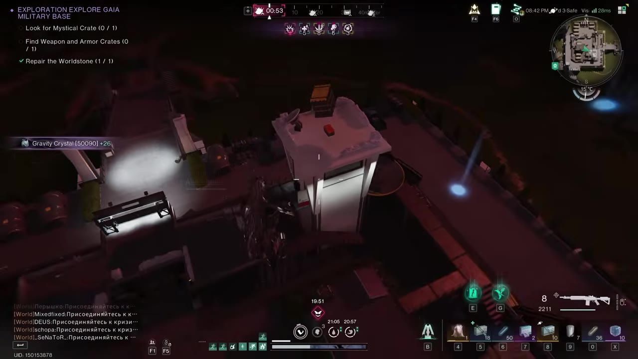 A view of a futuristic settlement during nighttime, showing a building and a Gravity Crystal nearby.