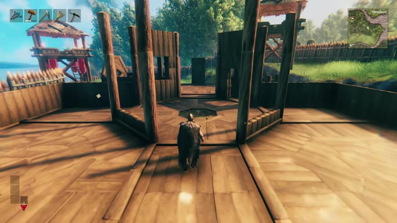A character stands near walls and flooring of a building in a medieval-themed environment.