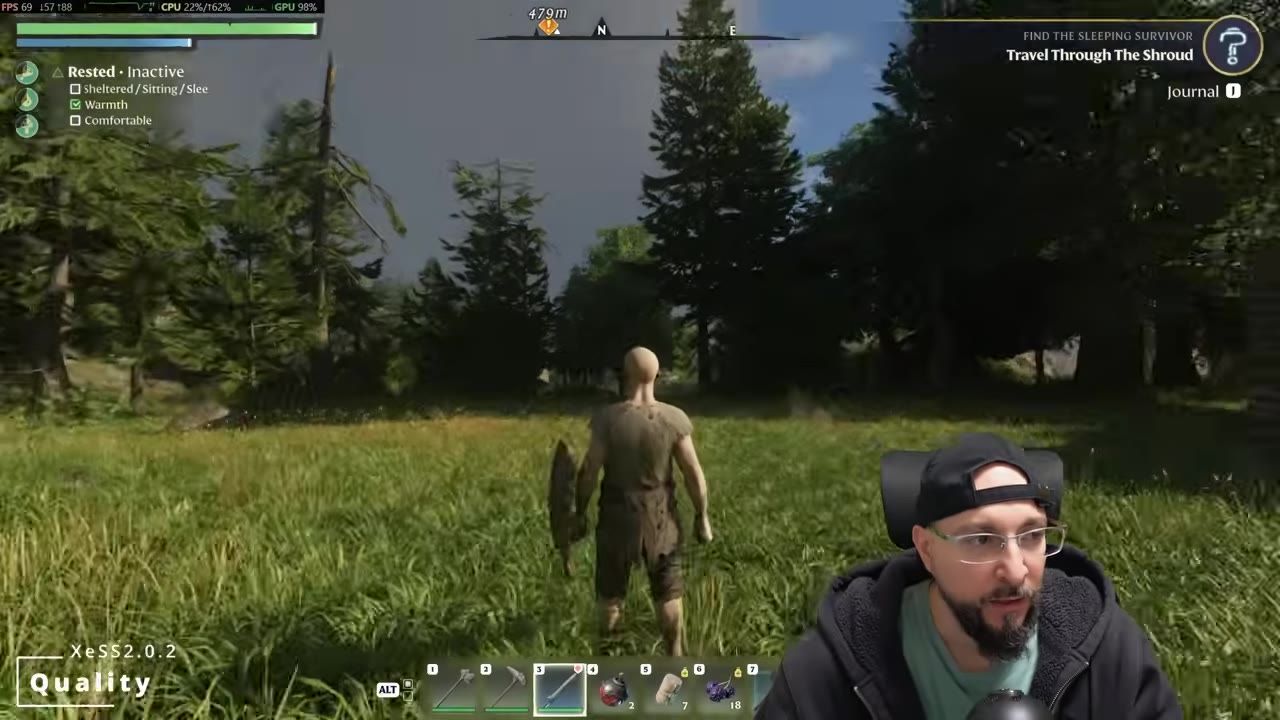A third-person Enshrouded character stands in a grassy forest clearing with the HUD visible, and an on-screen overlay at the bottom left shows XeSS 2.0.2 Quality.