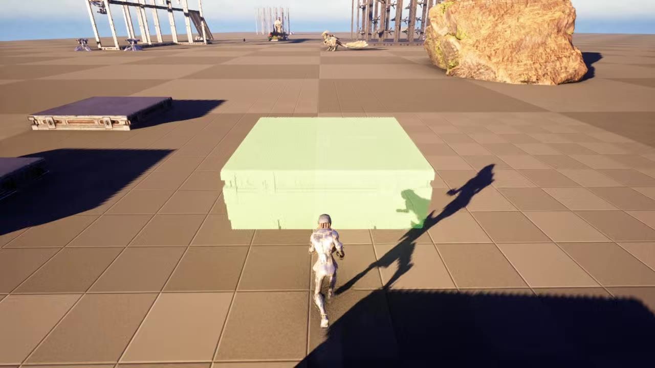 An avatar stands near a green highlighted foundation object on a tiled terrain.