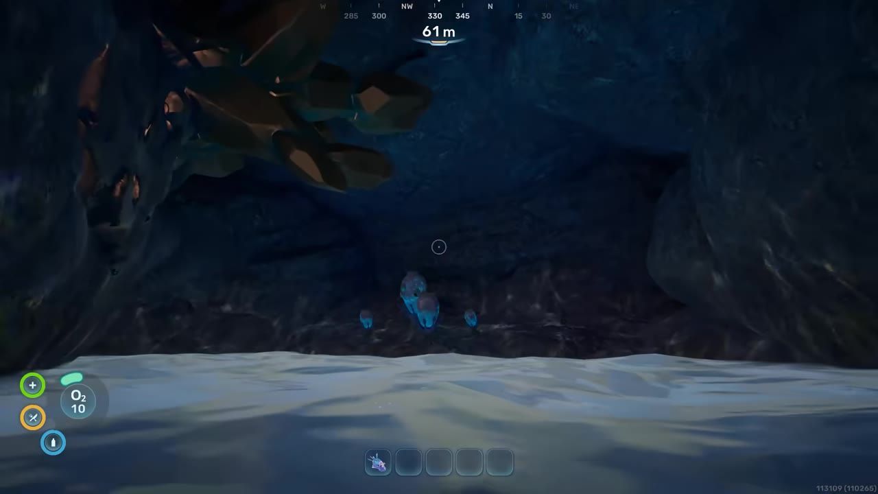 Underwater cave environment with visible mineral deposits on the ground.